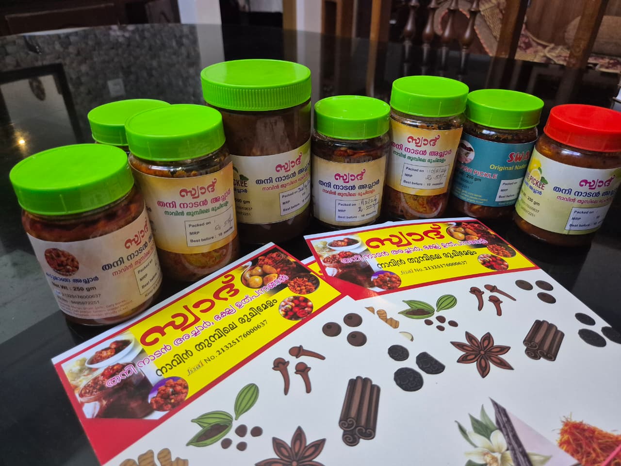 Close-up of Swadhu Nadan Acharukal pickle jar with spices