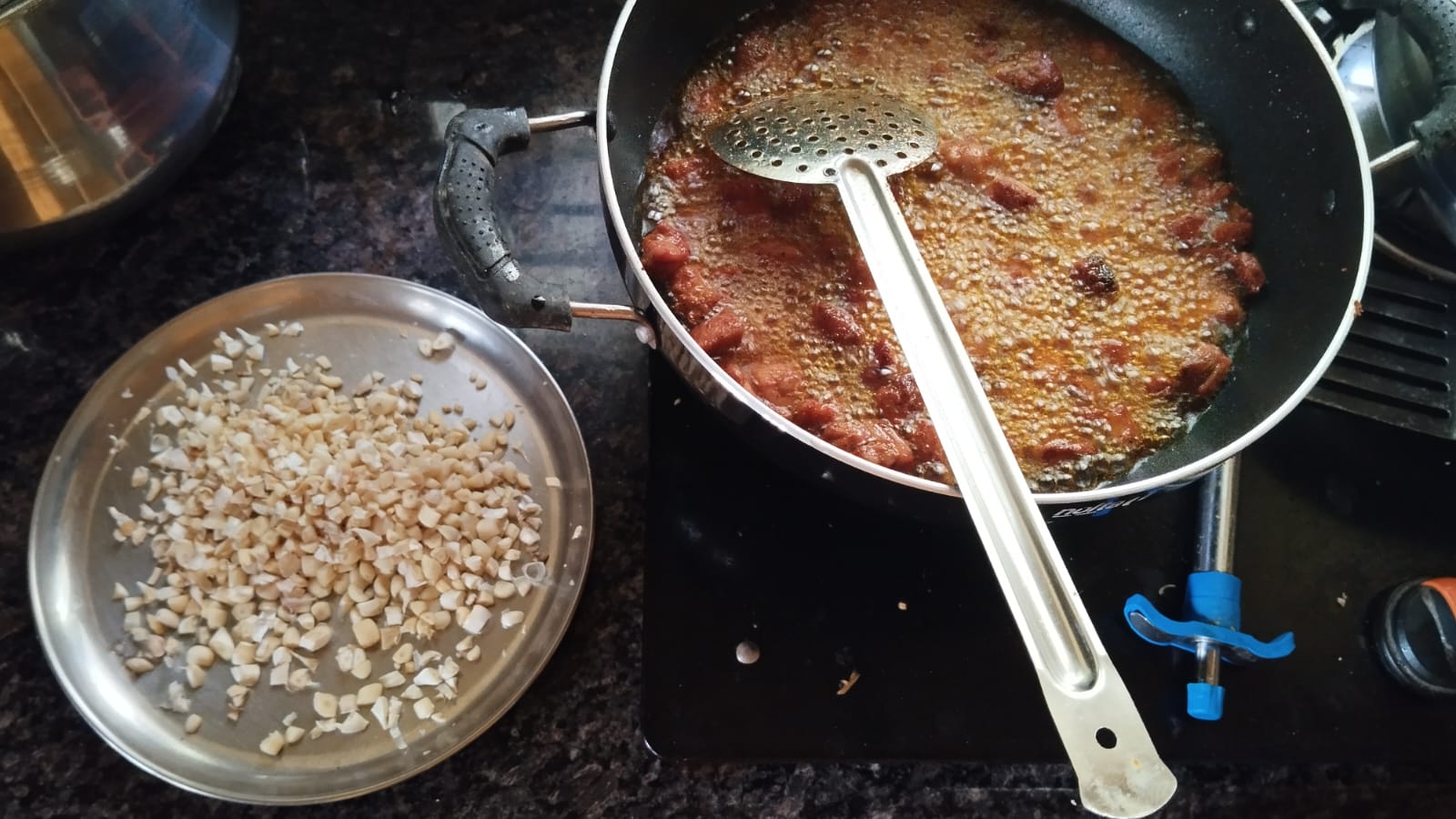 Fish pickle mixture with roasted spices being blended