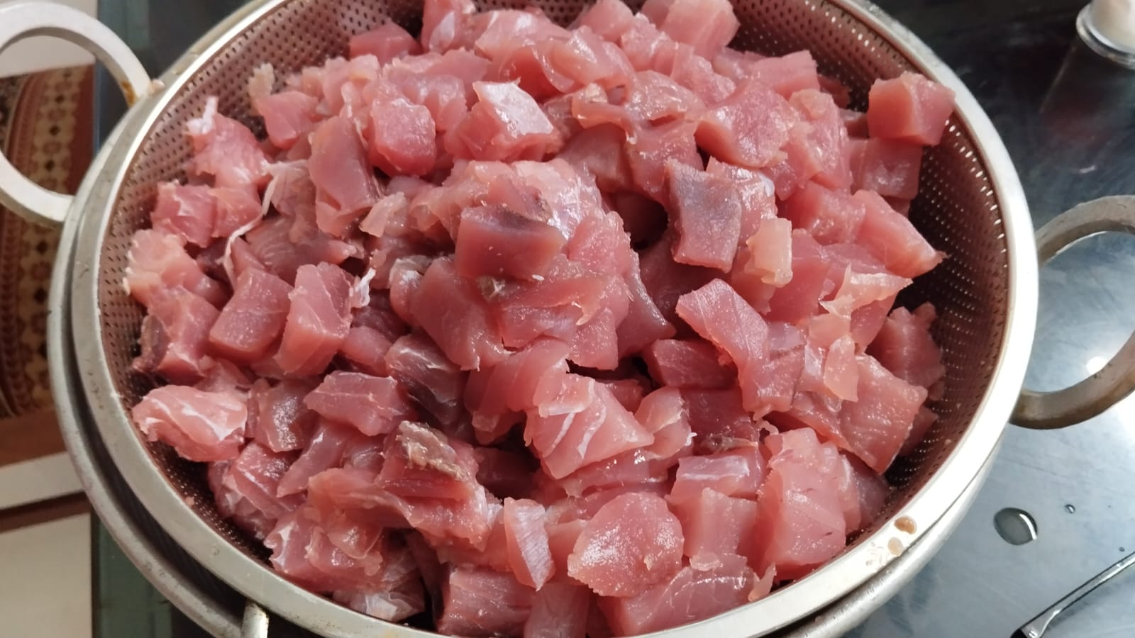 Fresh fish being cleaned and prepared for pickle making